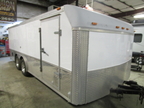 Long trailer in shop other side