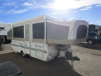 fully open popup RV in yard