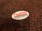 WERM (We Eliminate Rubber Mats) logo on carpet